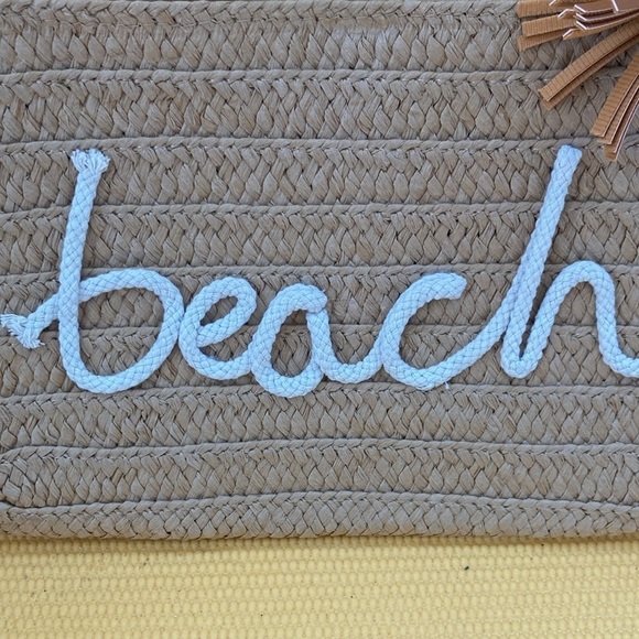 Beach Days Pom Pom Oversized Straw Clutch, Natural zipper closure 
10” x 7” - Picture 2 of 6